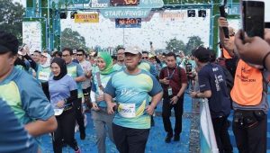 Lima Pengemudi Ojol Prasejahtera Peroleh Motor Listrik di PLN Electric Run 2024
